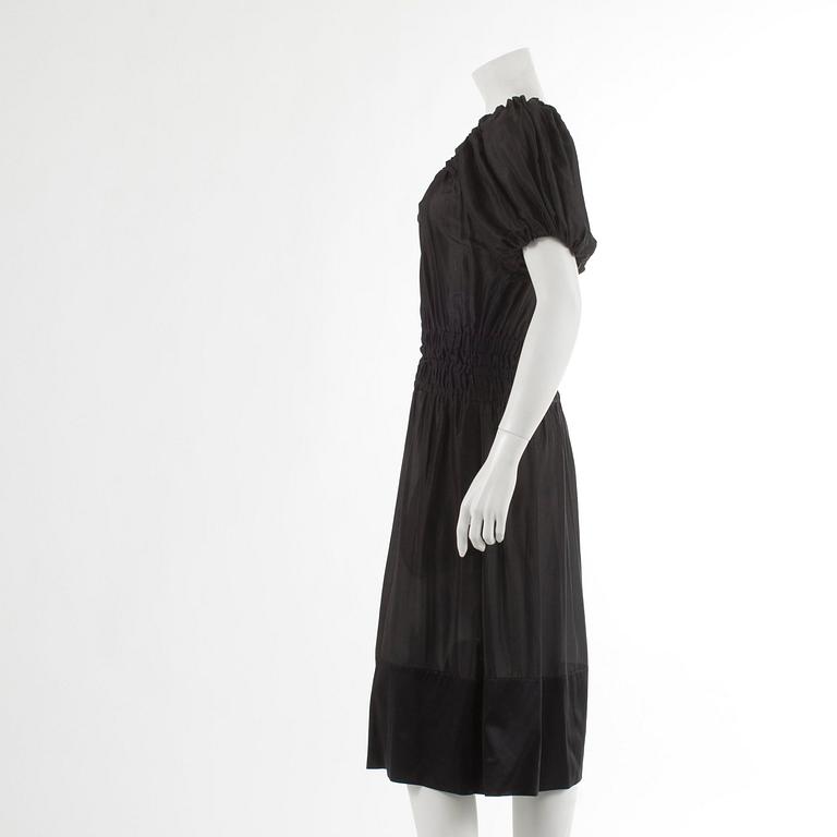 DKNY, a black silk dress. Size M.