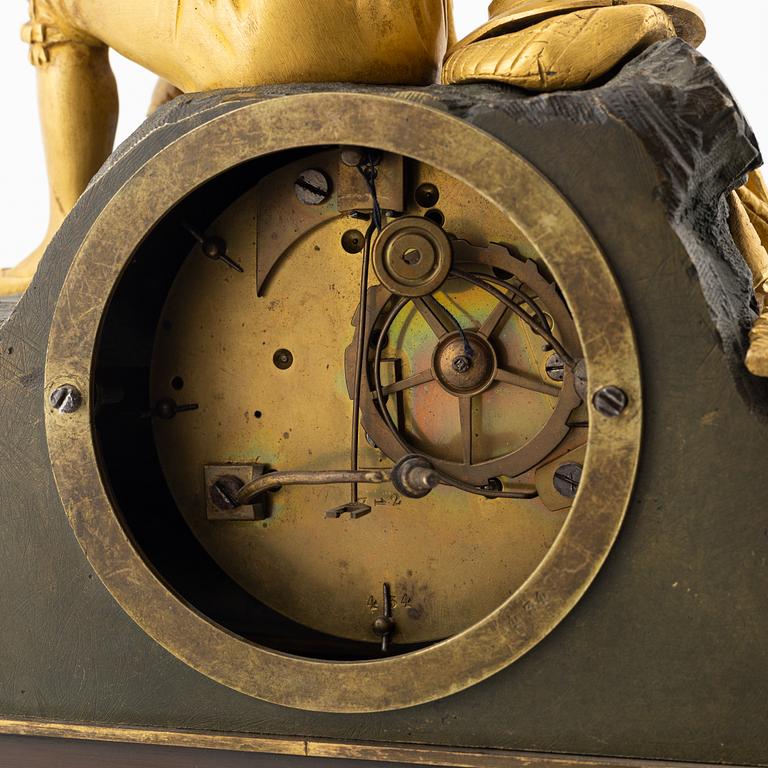 An ormolu and patinated bronze mantel clock, mid 19th Century.