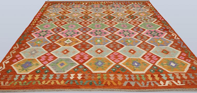 A Kilim carpet, approx. 290 x 253 cm.