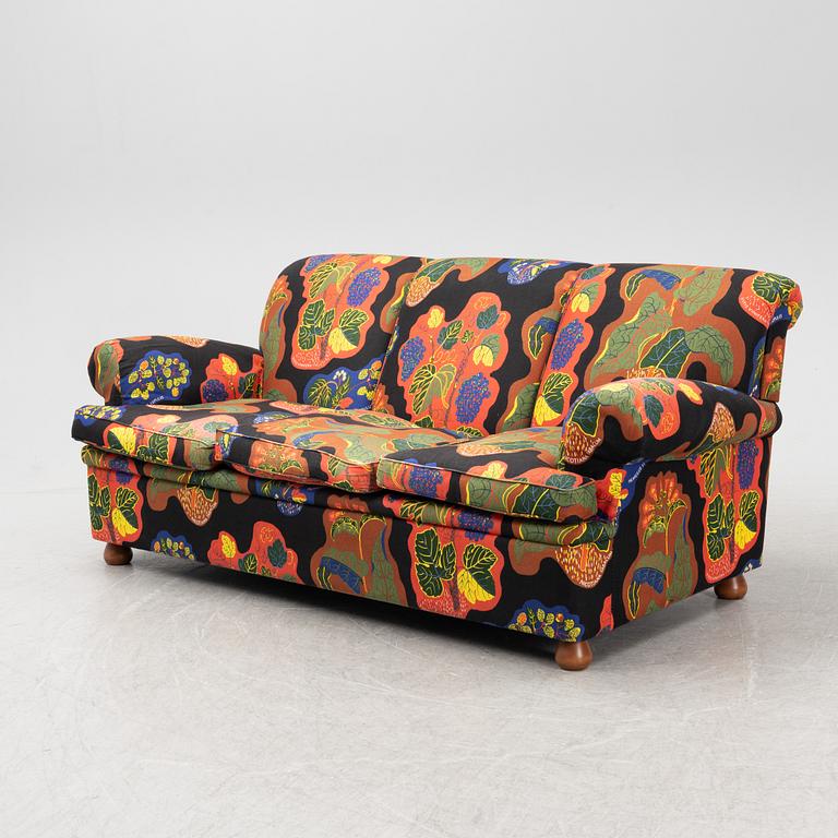 A model 703 sofa by Josef Frank for Firma Svenskt Tenn.