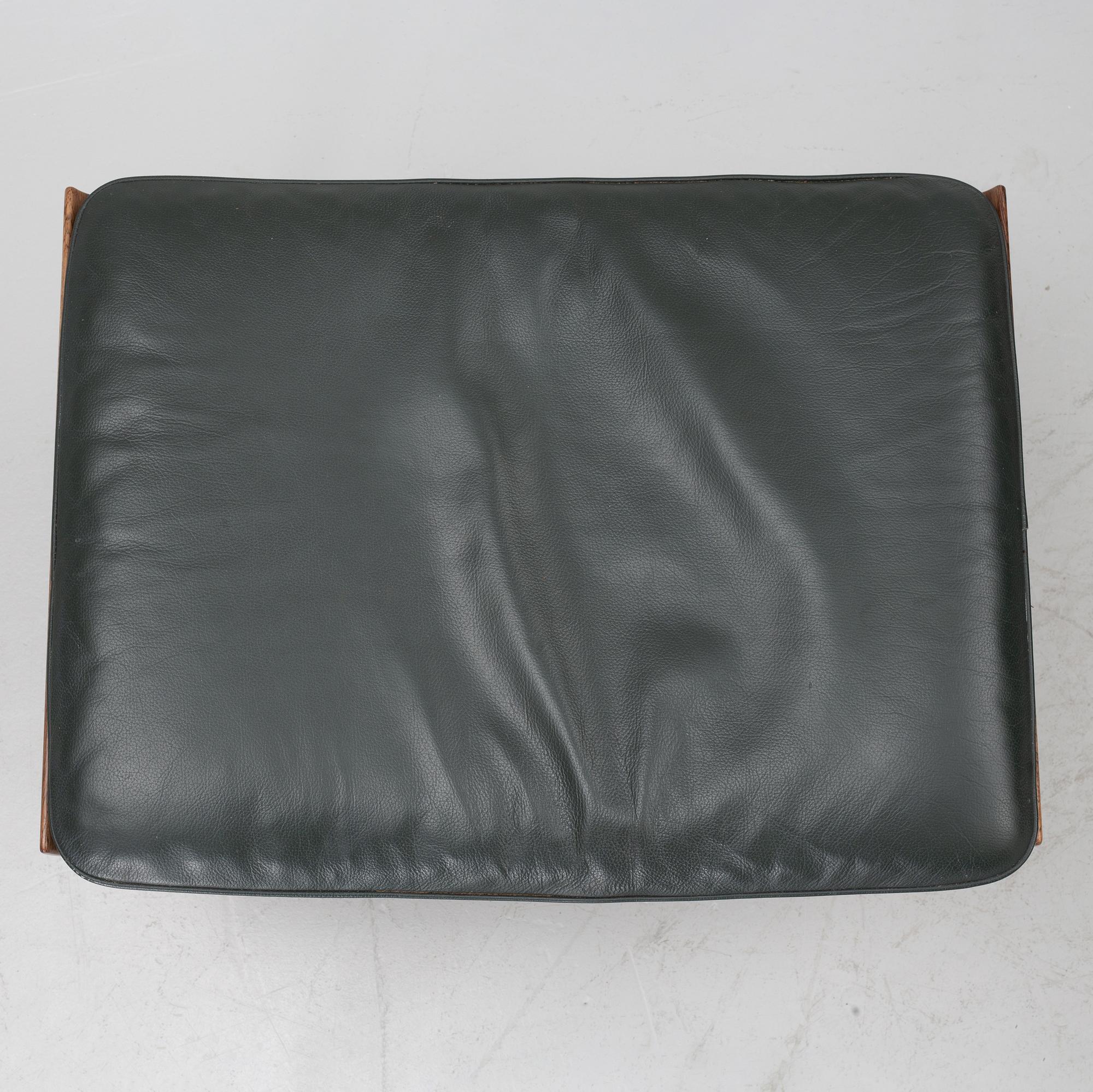 Finn Juhl, a 'Bwana' armchair and ottoman, France & Son, Denmark, 1960's.