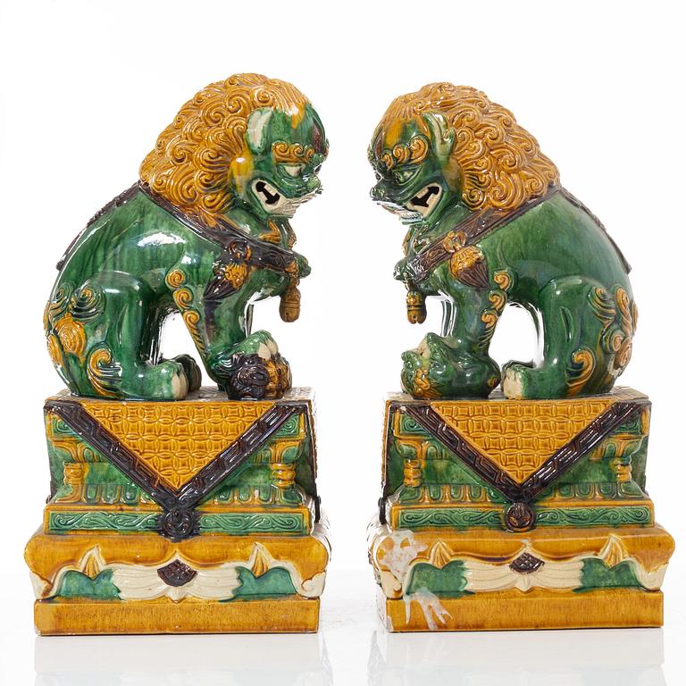 A pair of large figures of buddhist lions, China, second half of the 20th Century.