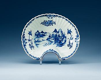 1579. A large blue and white base for a wallfountain, Qing dynasty, Qianlong (1736-95).