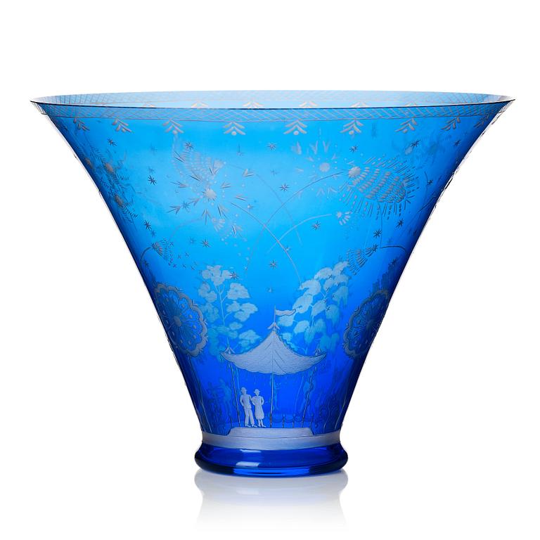 Edward Hald, an engraved blue glass "Fyrverkeriskålen" glass bowl, Orrefors 1957, engraved by Karl Rössler.