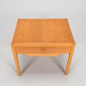 A mid-20th-century sewing table.