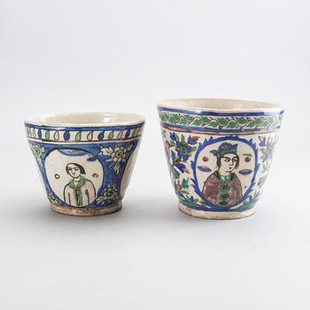 A set of two 19th century Persian earthenware pots.