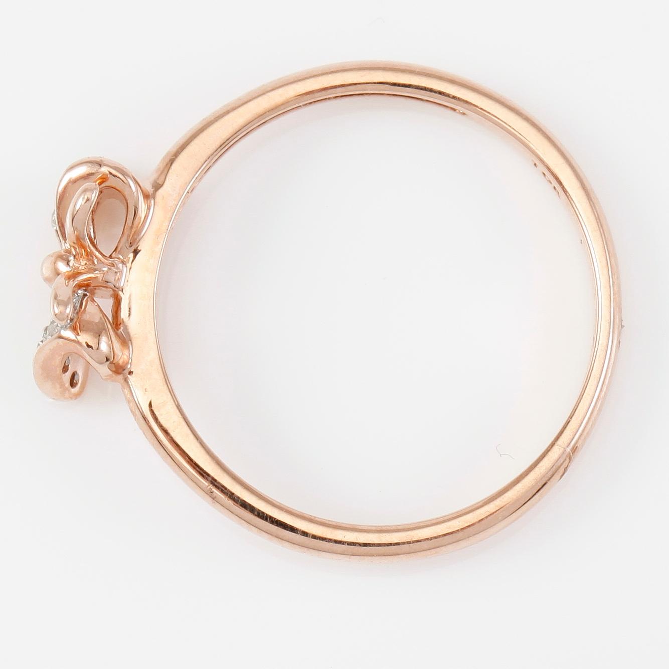 RING, 10K roséguld och diamanter tot ca 0.10 ct.