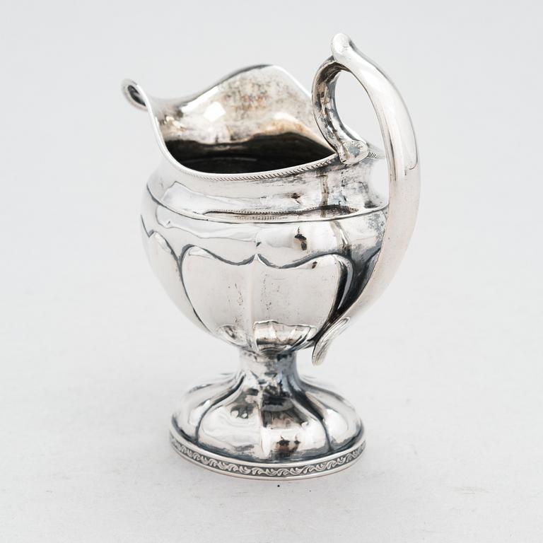 A mid-19th-century  Finnish silver cream jug, maker's mark of Johan Hellgren, Kristinestad 1843.