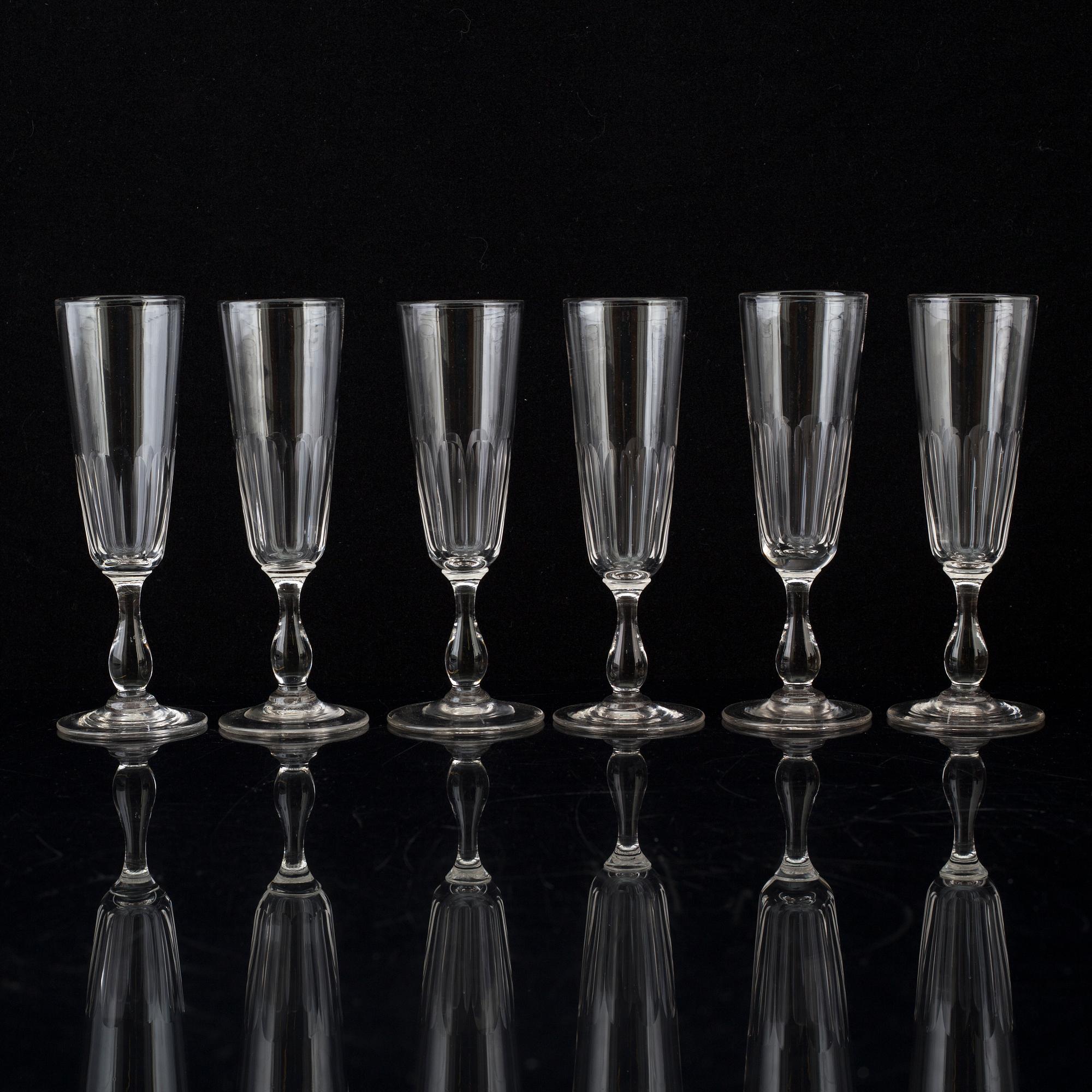 Six champagne flutes, circa 1900.