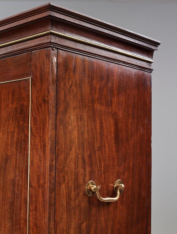 A late Gustavian mahogny cupboard.