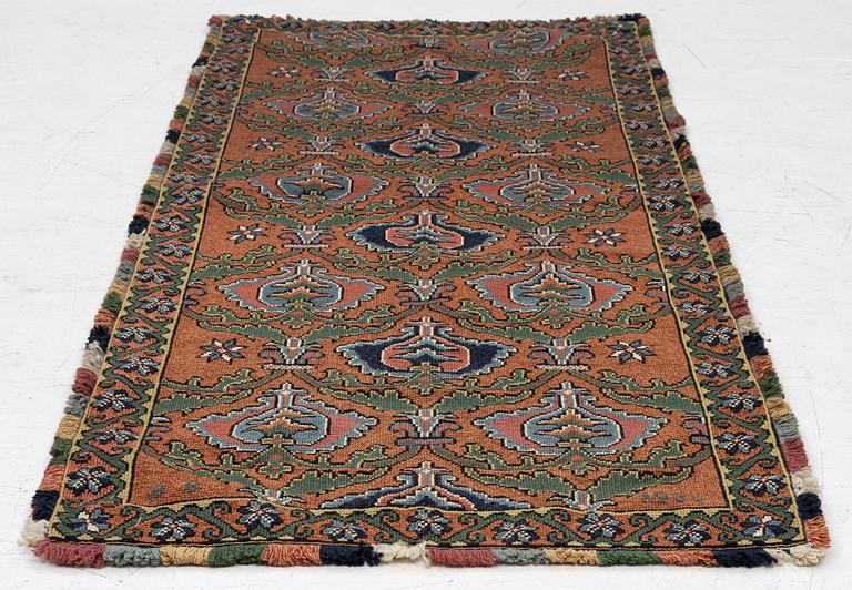 Sled cushion in folk art style, 20th century. 155 x 70 cm.