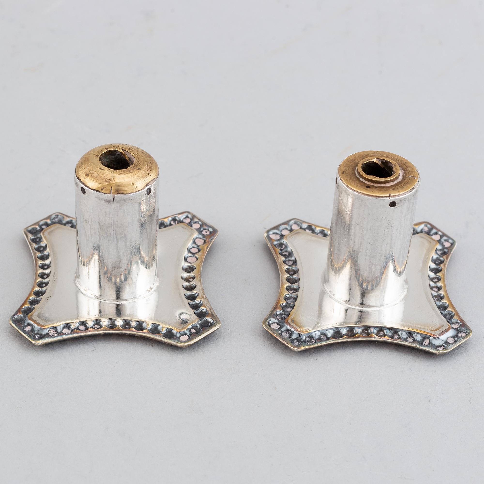 A pair of George III candlesticks, by John Parsons and Co., Sheffield 1788.