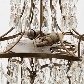 A gustavian style chandelier from the early 20th century.