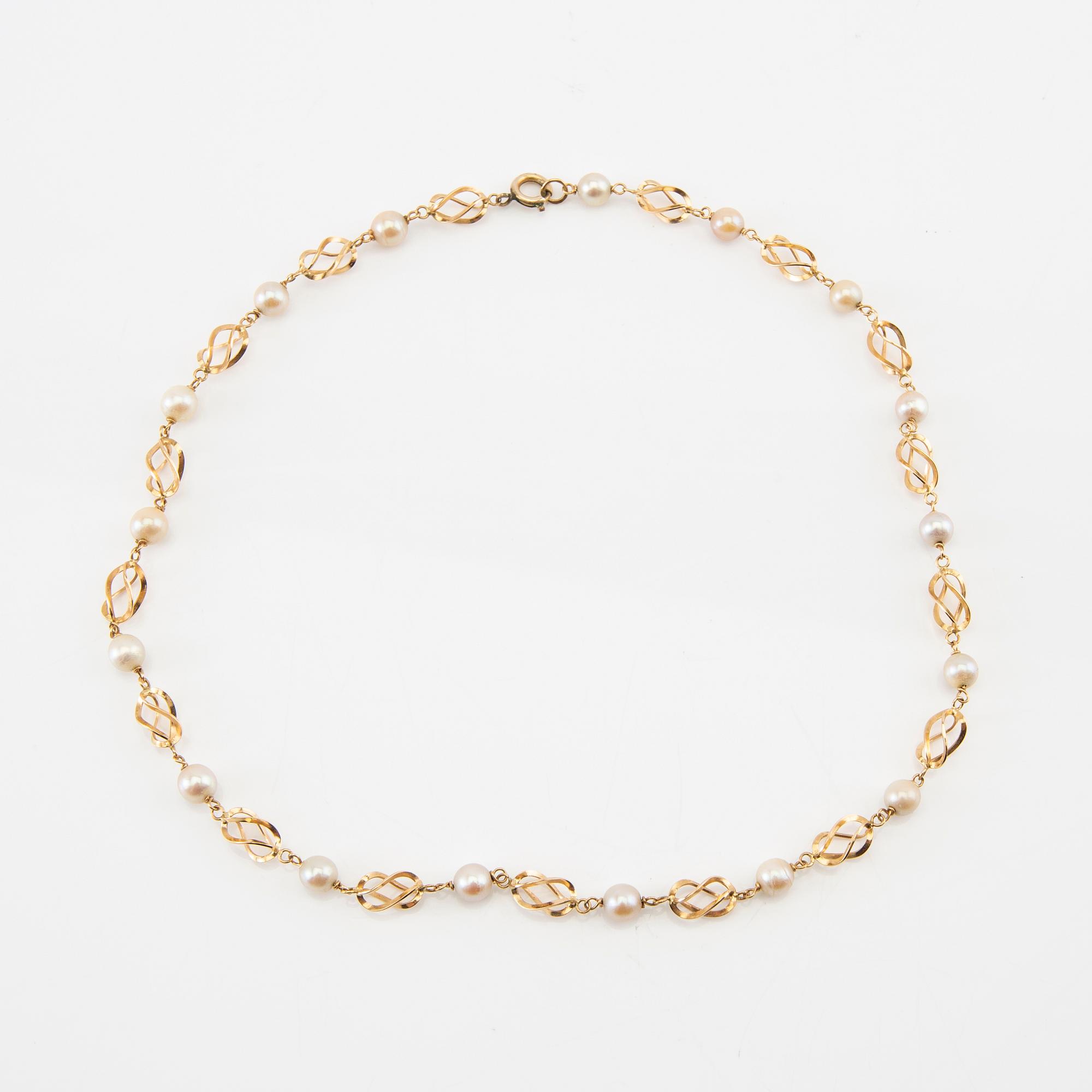Halsband 18K guld med odlade pärlor.