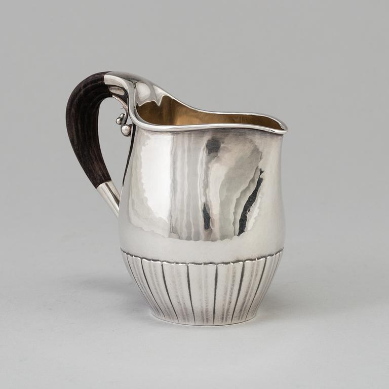 A"Cosmos", cream jug, sterling silver. Designed by Johan Rodhe for Georg Jensen, modell no 45E, weight 175 grams.
