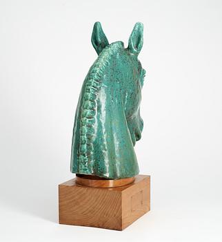 A Gunnar Nylund figure of a horse's head.