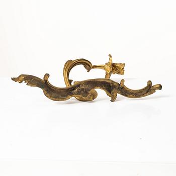 A pair of Rococo-style appliques, France, circa 1900.