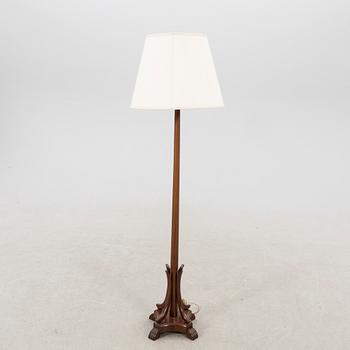 A wooden floor lamp first half of the 20th century.