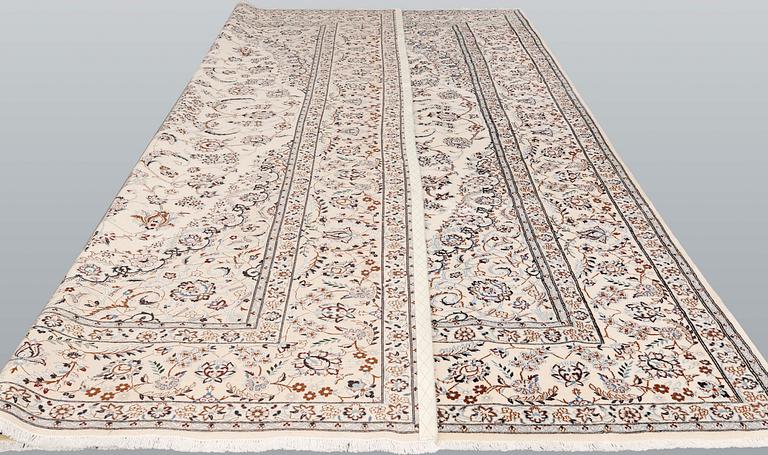 A Nain part-silk carpet, 395 x 293 cm.