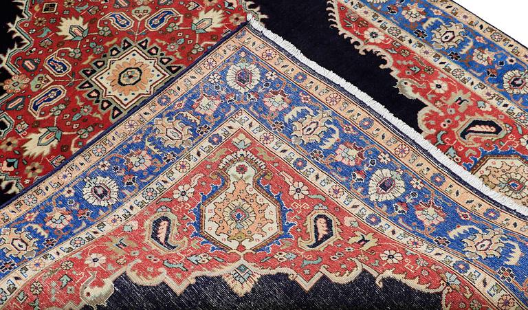 A carpet Tabriz around 265 x 170 cm.