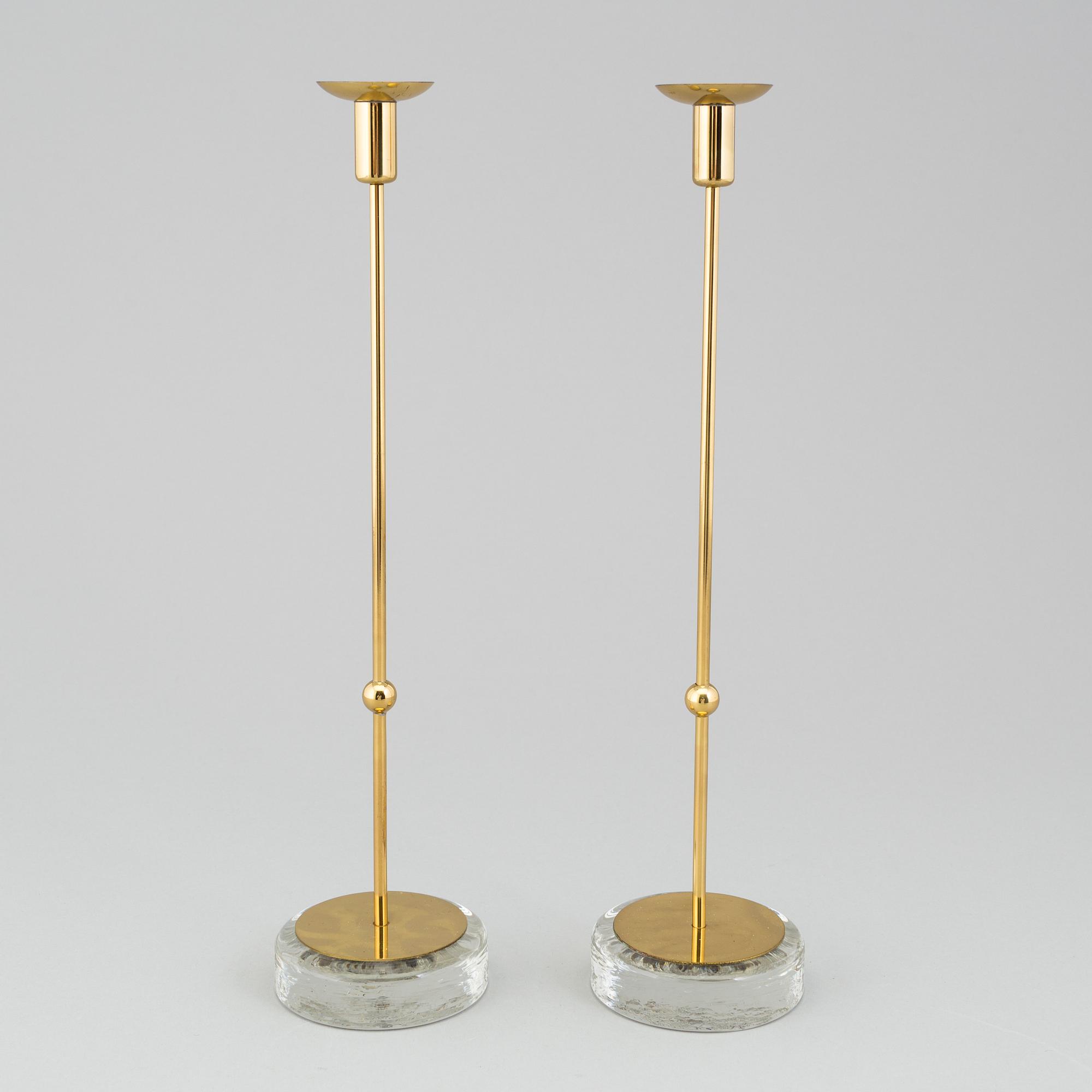 GUNNAR ANDER, A pair of Ystad metall brass candlesticks.