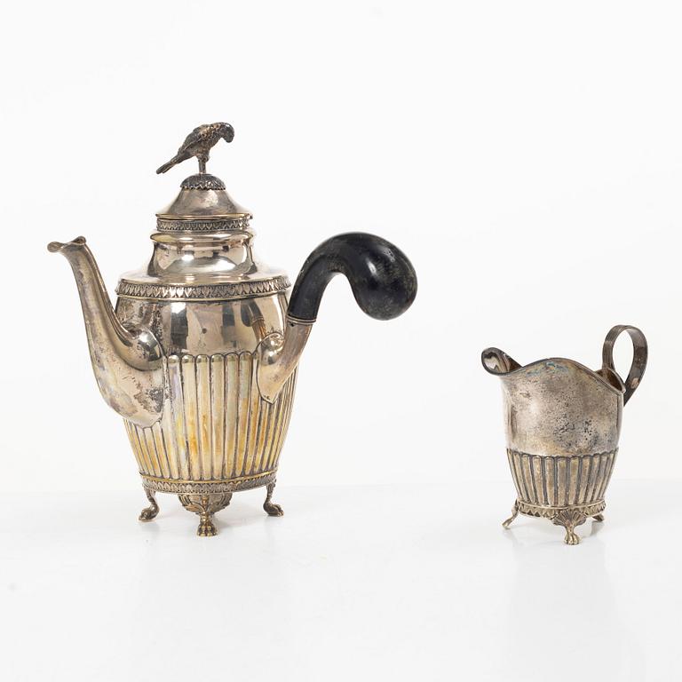 A Swedish silver coffee pot and cream jug, Gustavian style, early 20th century.