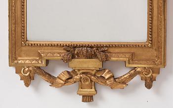 A Gustavian carved giltwood mirror by J. Åkerblad (master 1758-99).