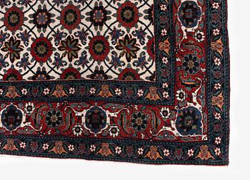 An antique Veramin carpet, West Persia, 380 x 271 cm.