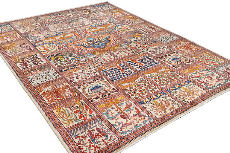 A Kashmar carpet, c. 391 x 291 cm.