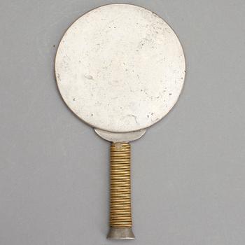 HANDSPEGEL, tenn, komponerad av Estrid Erikson och Björn Trägårdh, Firma Svenskt Tenn, 1900-tal.