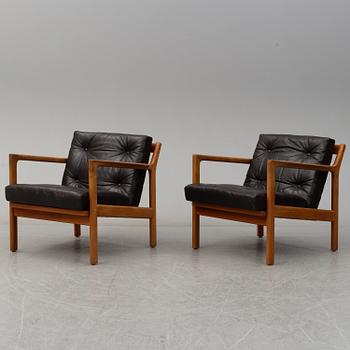 KARL ERIK EKSELIUS, a pair of 1960's teak armchairs.