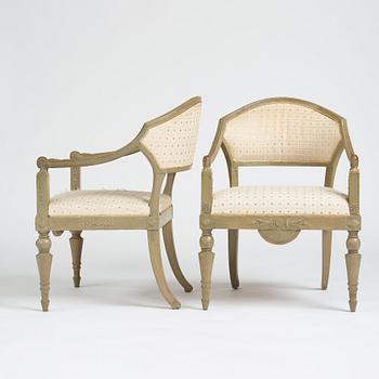 A pair of Late gustavian armchairs.