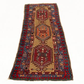 An antique Northwest Persian runner, c. 257 x 99 cm.