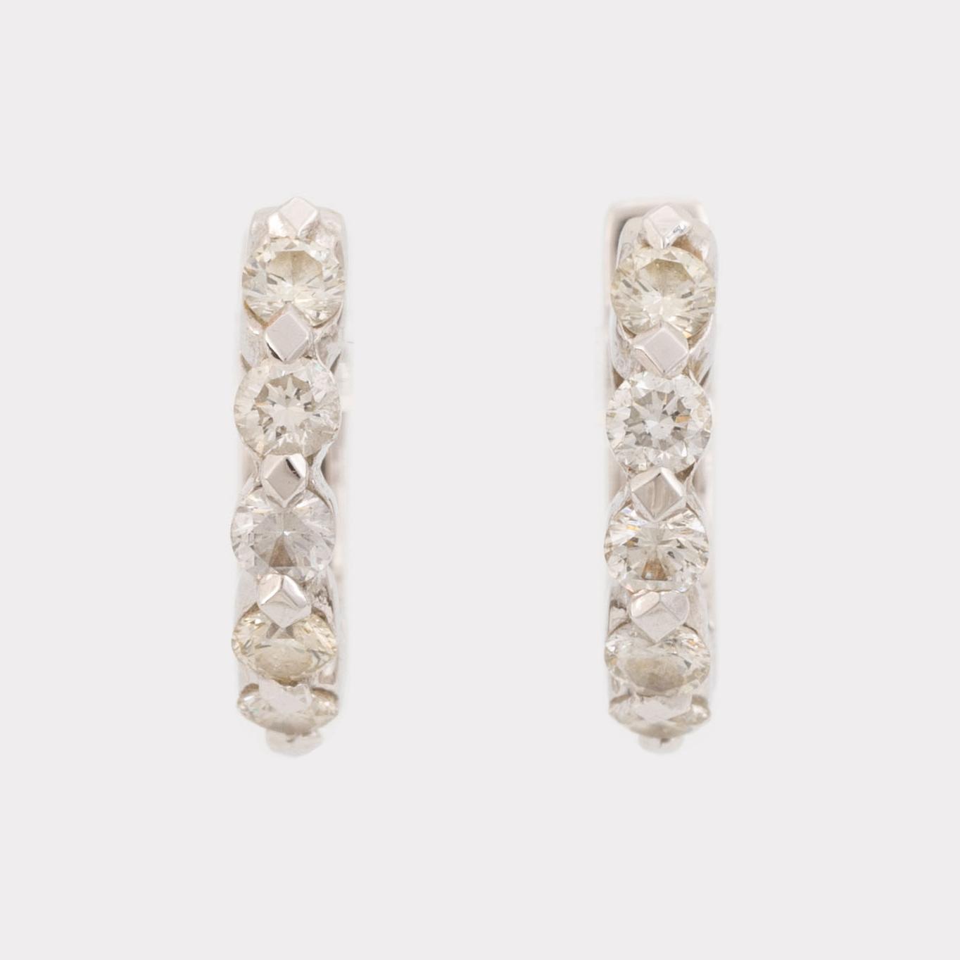 Brilliant cut diamond earrings.