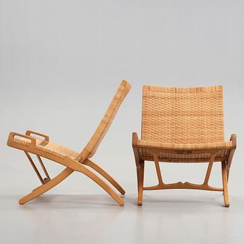 Hans J. Wegner, a pair of model 512 oak 'Folding Chairs' executed by Johannes Hansen, Denmark 1950's.