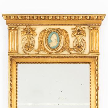 A Gustavian style mirror, circa 1900.