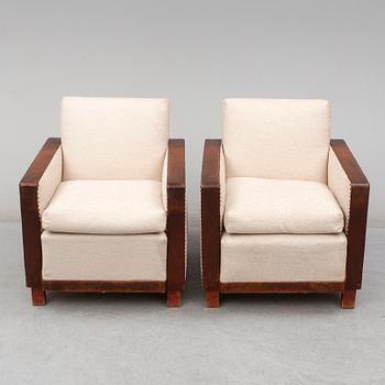 A 1930's pair of model 184 easy chairs by Björn Trägårdh, Firma Svenskt Tenn.