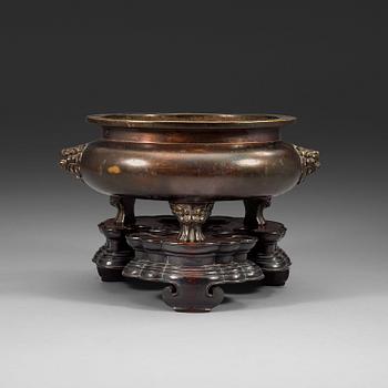 A large bronze tripod censer, Ming dynasty (1368-1644), with Xuande six character mark.