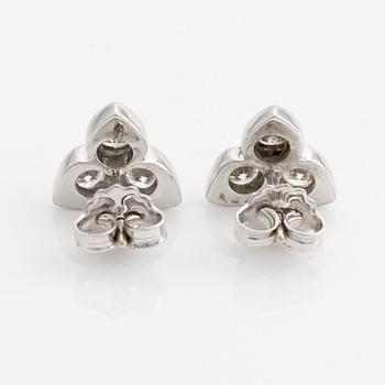 A pair of 18K white gold earrings with round brilliant-cut diamonds.