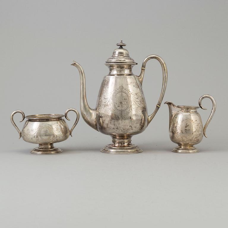 A three part silver coffee service.