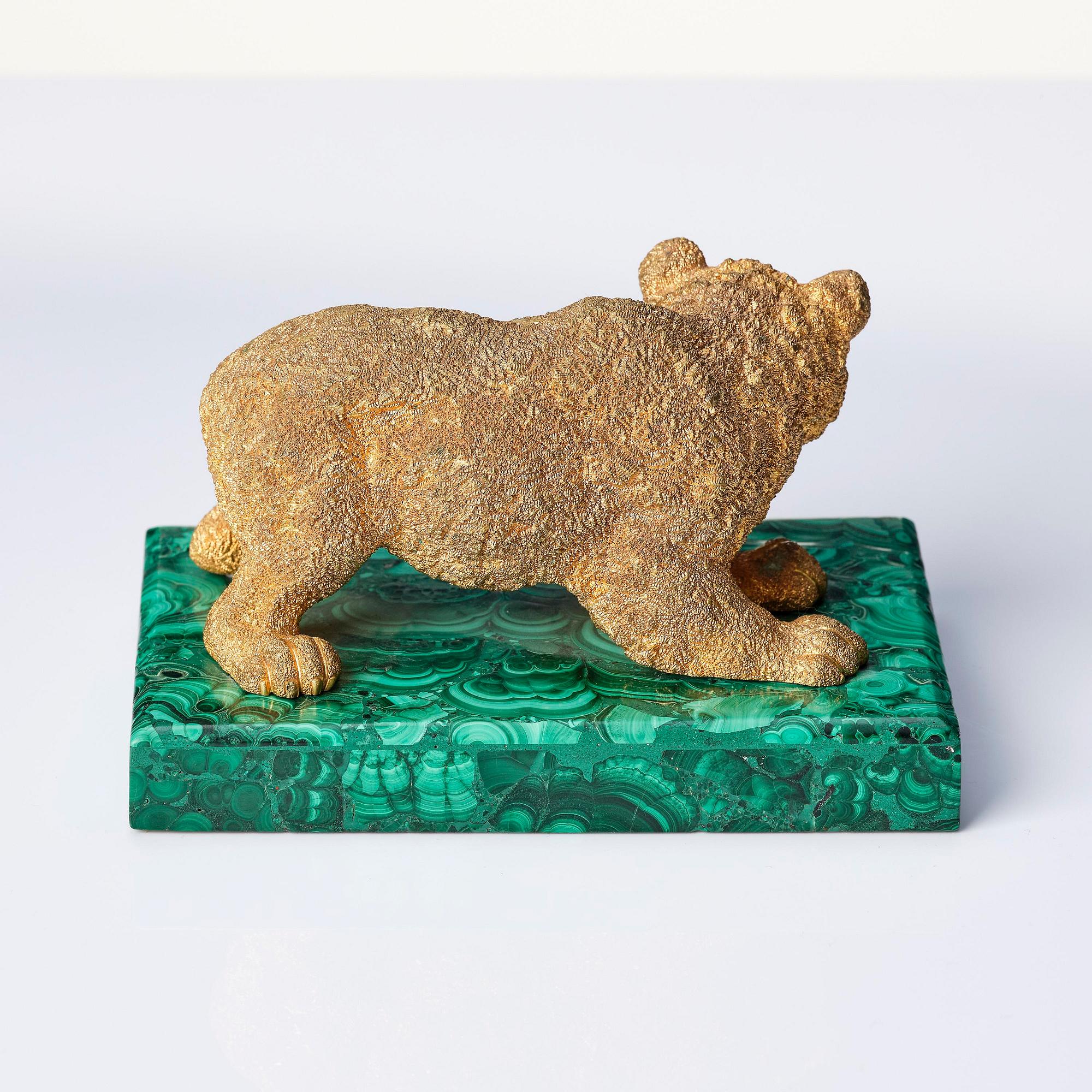 A Russian Nicholas II malachite-veneered and ormolu paperweight, late 19th century.