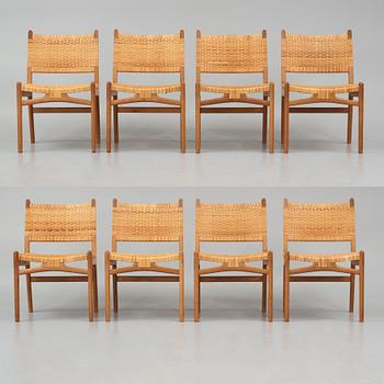 Hans J. Wegner, a set of eight "CH31" oak and rattan chairs, Carl Hansen & Son, Denmark 1950s.