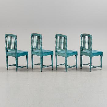 A set of four 19th century folk art chairs.