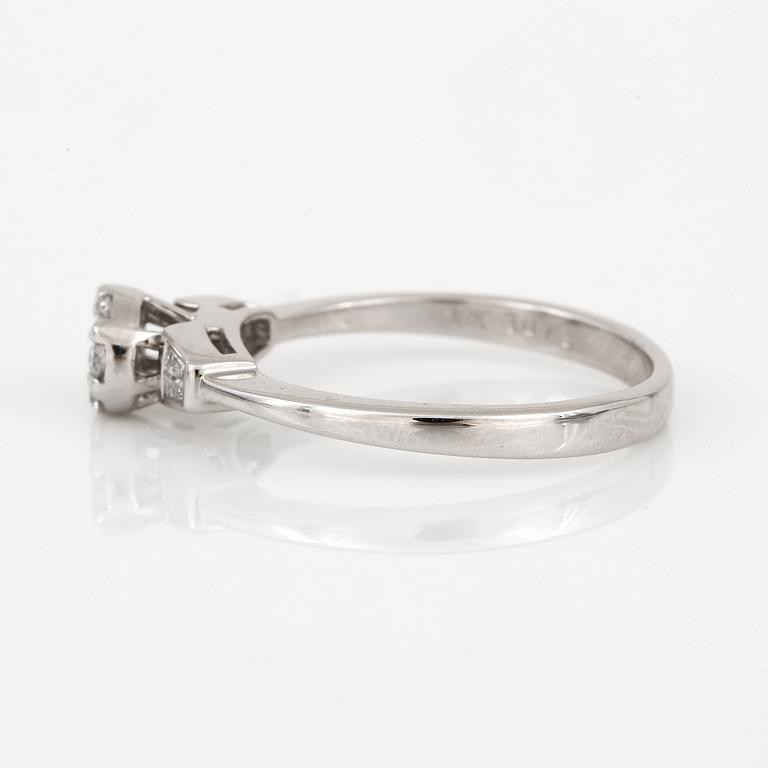 RING, med briljant och baguetteslipade diamanter, totalt ca 0,24 ct.