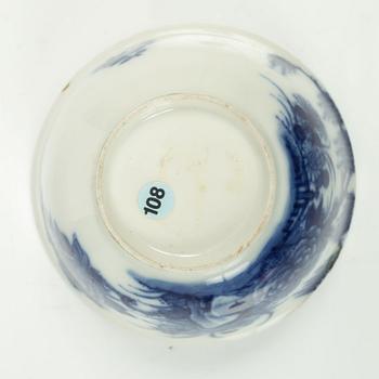 A Chinese soft paste cup with saucer, Qing dynasty, 18th century.