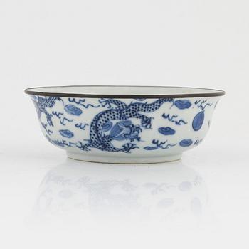 Two blue and white porcelain bowls and a lid, China, Ming dynasty and late Qing dynasty.