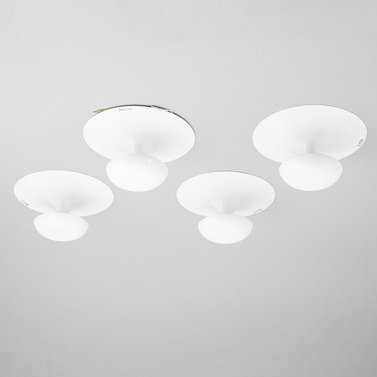 A set of four wall lamps from Vibia, Spain, 21st Century.