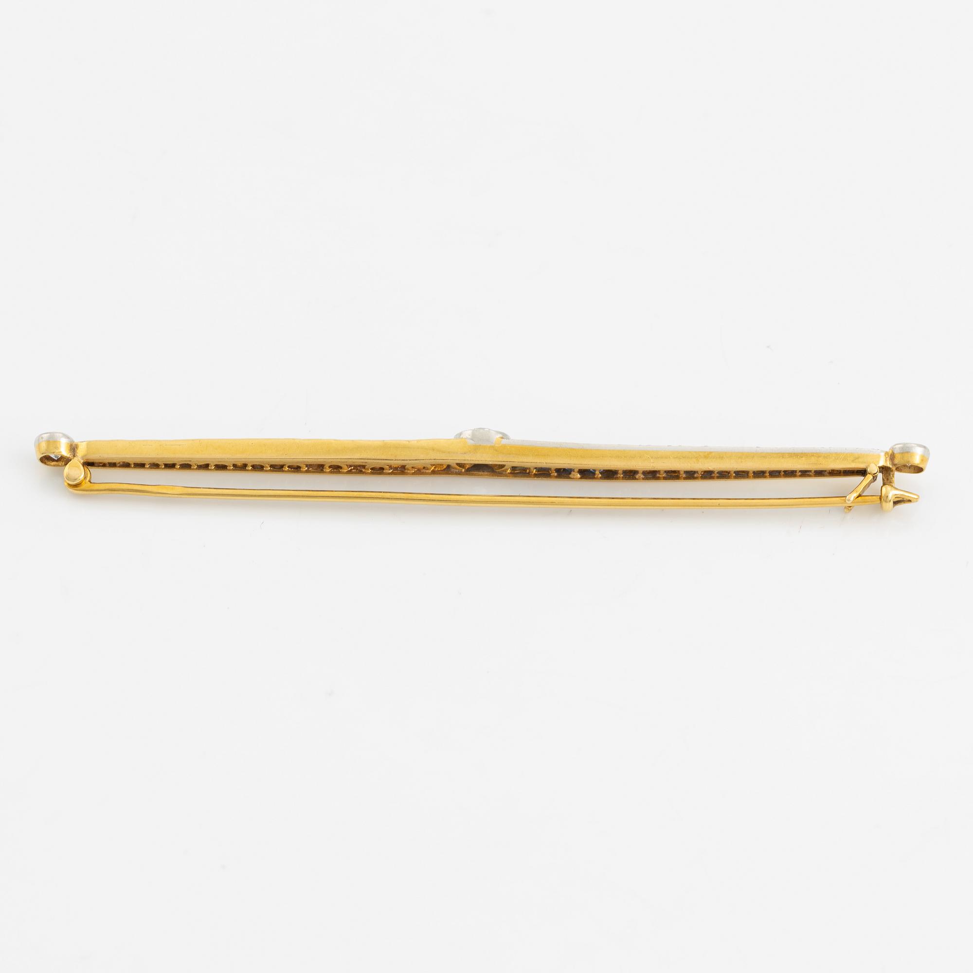 Brosch, gold with old-cut diamonds and princess-cut sapphires.