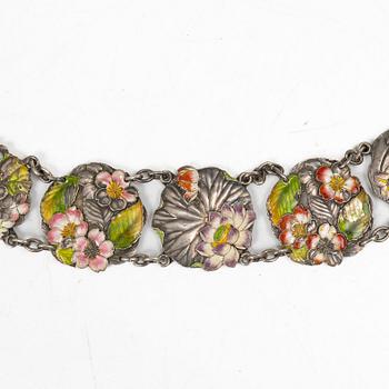A Japanese Art Nouveau silver and enamel floral belt, by Sanju Saku, Meiji period (1868-1912).