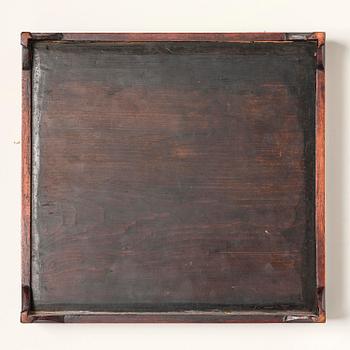 A Chinese kesi insignia/buzi mounted in a tray, late Qing dynasty.